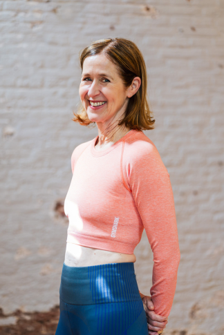 A portrait photo of a woman smiling